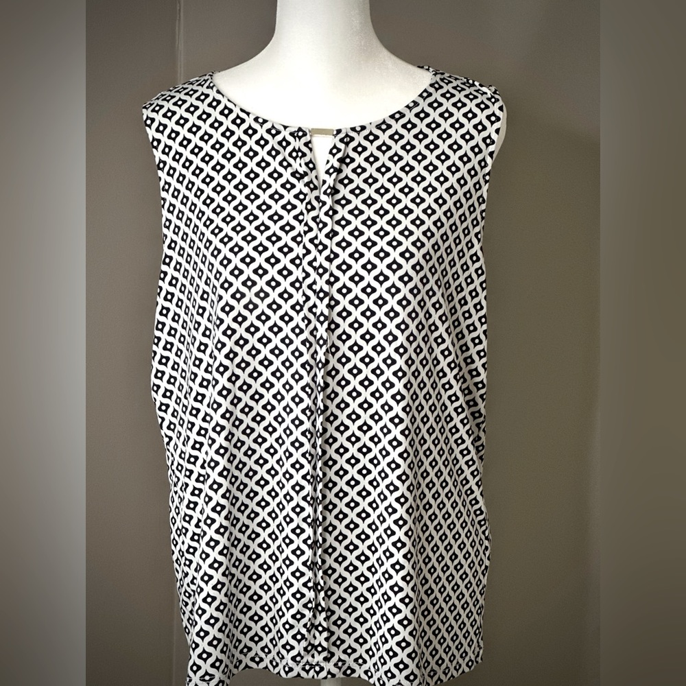 Navy and white geometric pattern with silver metal accent tunic top